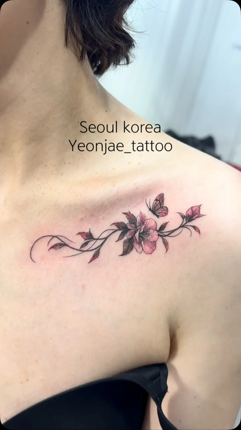 Tattoo artwork shared by Yeonjae Tattoo — A delicate hibiscus flower tattoo placed along…