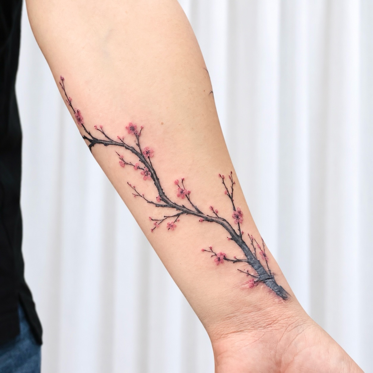 Plum blossoms: a wrist scar cover-up — Yeonjae Tattoo