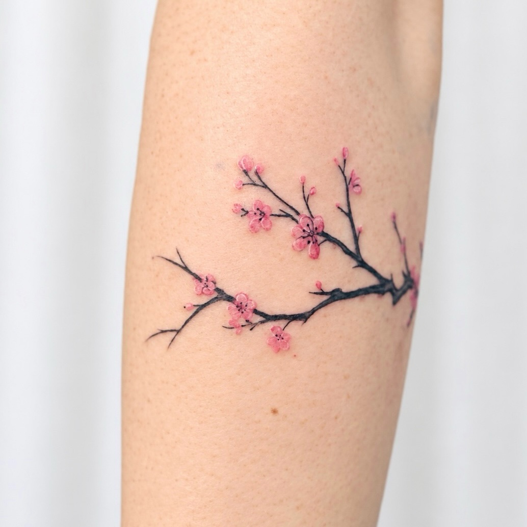 Plum blossoms: a wrist scar cover-up — Yeonjae Tattoo