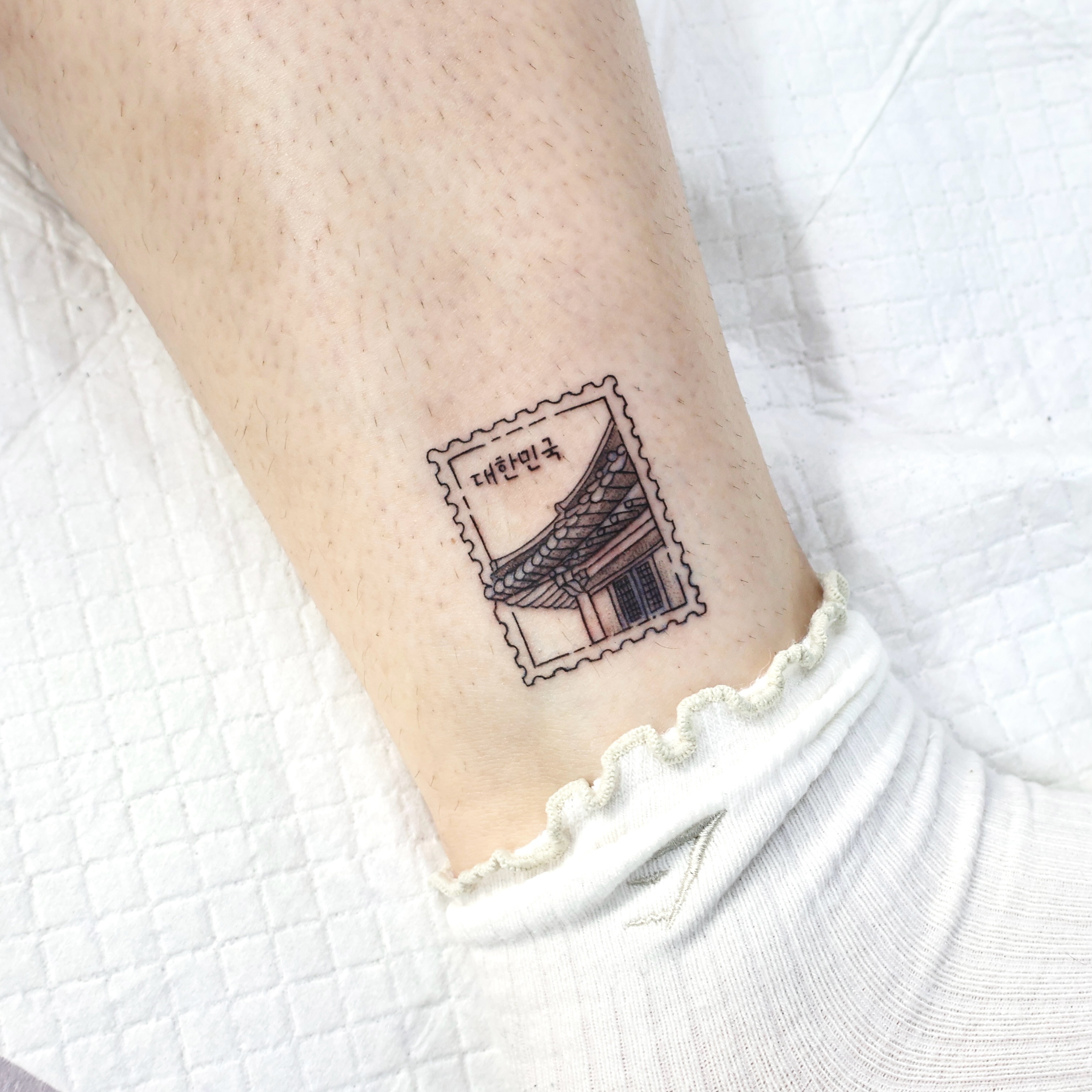A Korean postage stamp tattoo — Yeonjae Tattoo